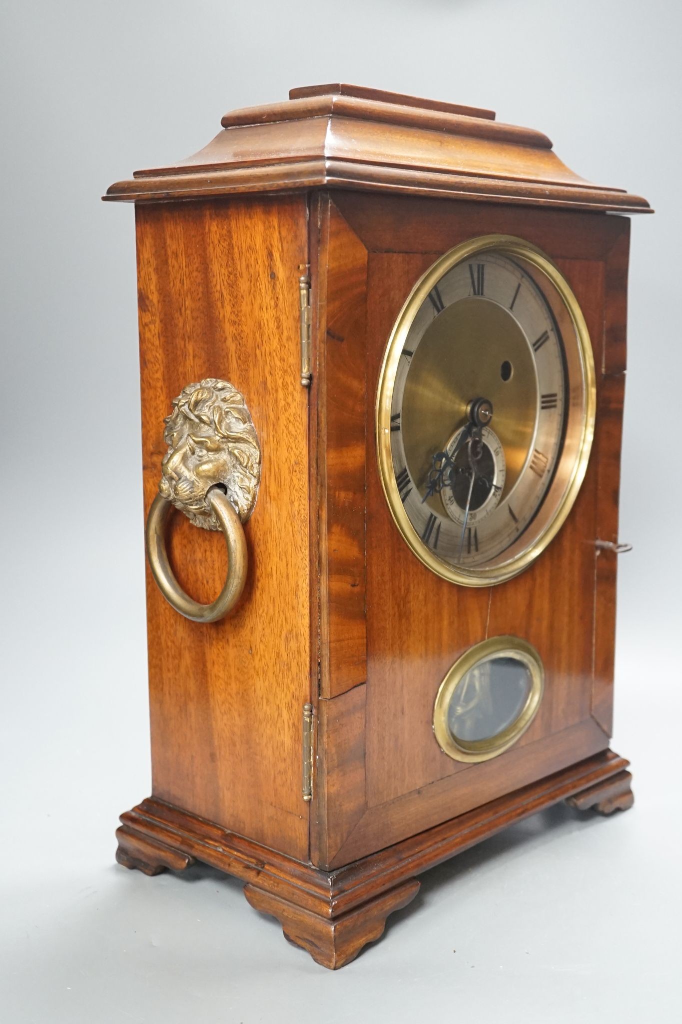 A mahogany and brass mounted bracket timepiece, 42cm, with adapted single fusee movement and visible wheel escapement